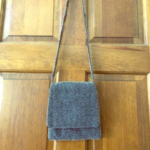 Gray evening bag with crystal - like sparkles